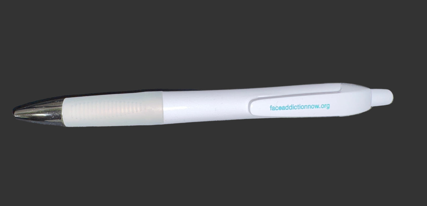 White pen with a logo on a gray textured surface